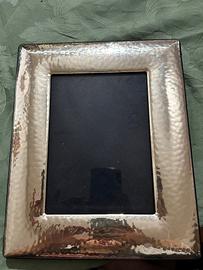 Cornice in argento