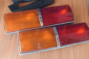 Fanali e braccioli Fiat 124 1 serie