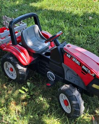 Trattore a pedali Peg Perego rosso con rimorchio