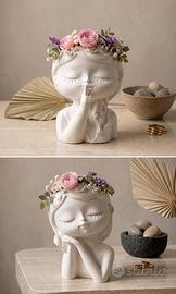 Coppia di porta candele decorativi con bambine