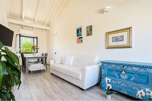Villa a schiera con cortile e garage
