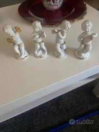 Set 4 statuine putti musicanti porcellana bianca