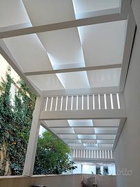 Pergola in legno con teli ad onda in PVC