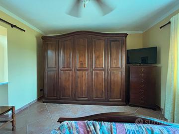 Camera da letto in noce nazionale