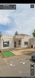 Locale comm.110 mq con 90mq di spazio antistante