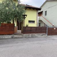 Cancellata in ferro ginzato e legno