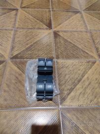 interruttore  sportello lato guida 