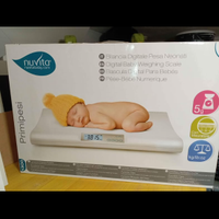 Bilancia pesa neonati