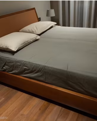 Letto matrimoniale  con contenitore. 