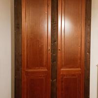 armadio letto comodini poltrona 