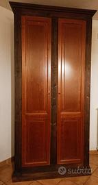 armadio letto comodini poltrona 