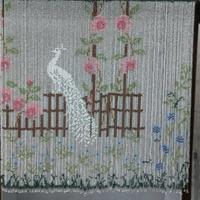 2 tende di perle con pavone