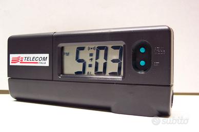 Orologio con sveglia e torcia