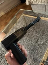 Mini aspirapolvere senza fili per la macchina