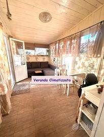 ROMANINA BILOCALE ARREDATO Con GIARDINO - VERANDA