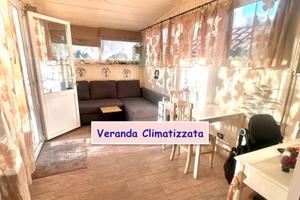 ROMANINA BILOCALE ARREDATO Con GIARDINO - VERANDA