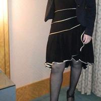 vestito nero Maxx con bordino dorato 