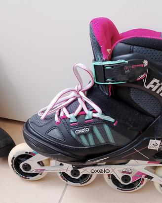 Pattini in linea con caschetto bambina