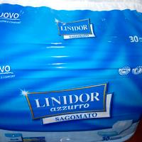 Tre pacchi di pannoloni nuovi