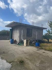 Terreno con casa nuova costruzione