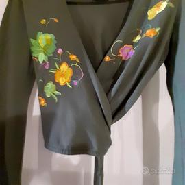 Particolare capo allacciatura in vita con  laccita