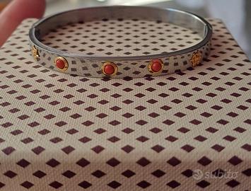 Bracciale oro giallo 750,18kt, acciaio e corallo 