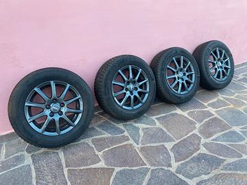 4x CERCHI RIAL 15" TITANIO GOMMATI HANKOOK M+S