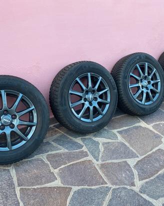 4x CERCHI RIAL 15" TITANIO GOMMATI HANKOOK M+S