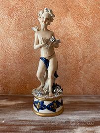Statuina in porcellana , putto 24 cm