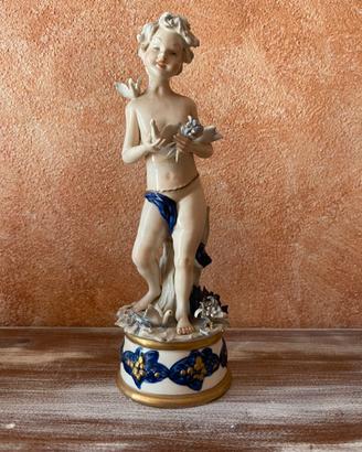 Statuina in porcellana , putto 24 cm