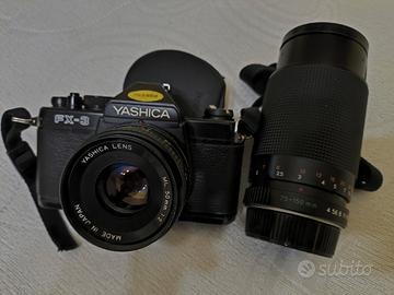 macchina fotografica Yashica FX3 con teleobiettivo