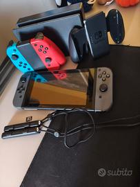 Nintendo Switch v1 un+ 2 joycon + sd64 giga+ cover