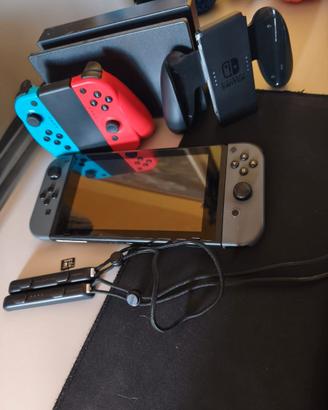 Nintendo Switch v1 un+ 2 joycon + sd64 giga+ cover