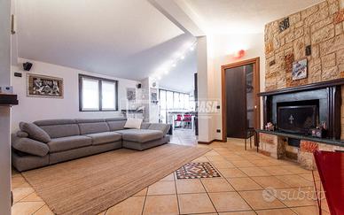 TRILOCALE CON GIARDINO E TERRAZZO