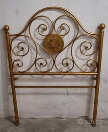 Testata in ferro battuto