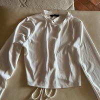 Magliettina maniche lunghe mezza aperta dietro