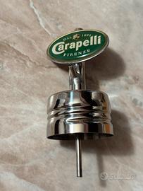 Tappo dosatore in metallo