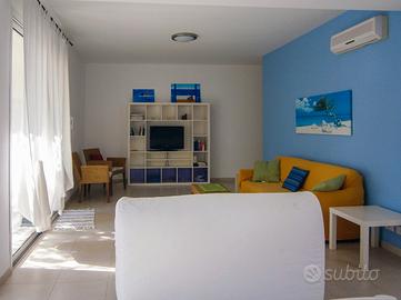 Casa con giardino