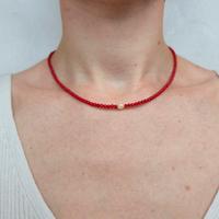 Collanina in acciaio con perline corallo bamboo
