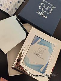 Cornice argentata specchio argento foto cerimonia