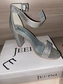 Scarpe con tacco alto