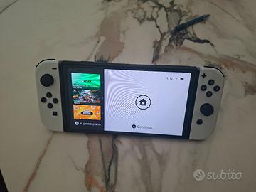 nintendo switch oled  +  abbonamento online 1 anno