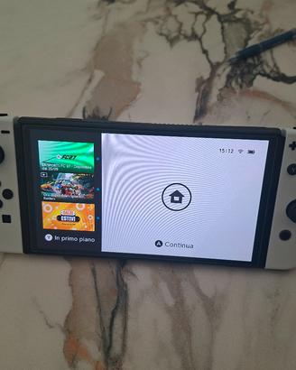 nintendo switch oled  +  abbonamento online 1 anno