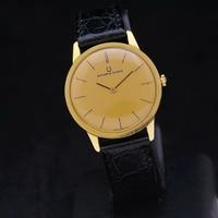 Universal Geneve 60s unisex 31mm 18 kt g.f. manual