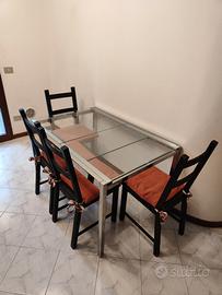 Tavolo in vetro e acciaio allungabile Ikea + sedie