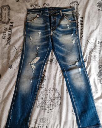 Jeans strappati uomo 