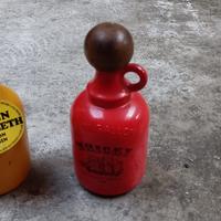 Coppia di bottiglie decorative in vetro  colorato