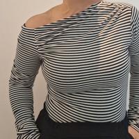 Maglia moda con scollo nella spalla 