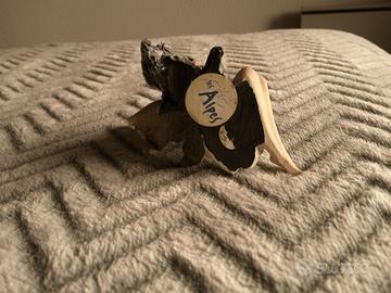 fata da collezione les alpes, con ala sbeccata