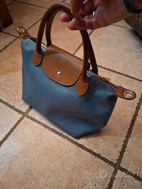 borsa nuova pelle blu chiaro e marrone con traco